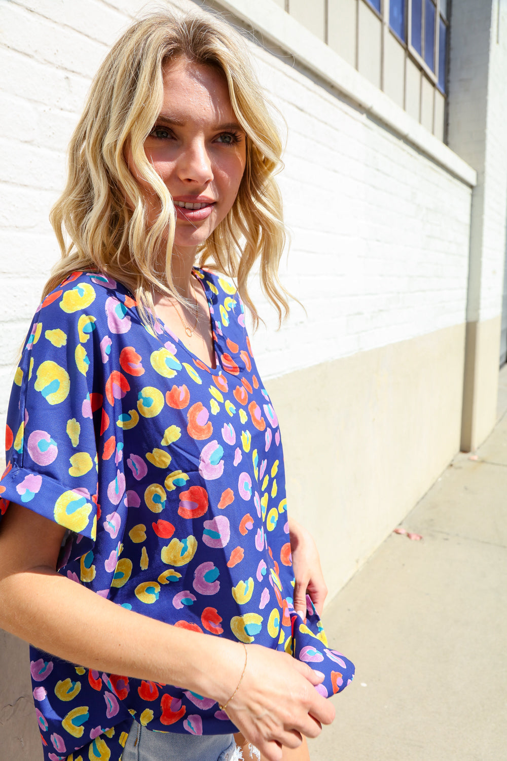 Follow Me Navy Blue Animal Print V Neck Dolman Hi-Lo Blouse