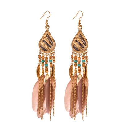 Feather earrings and pearl earrings