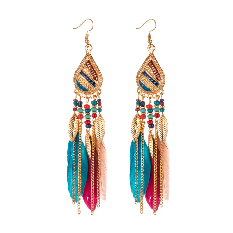 Feather earrings and pearl earrings